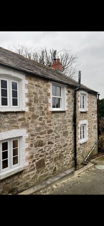 A completed white door installation for a Cornwall home
