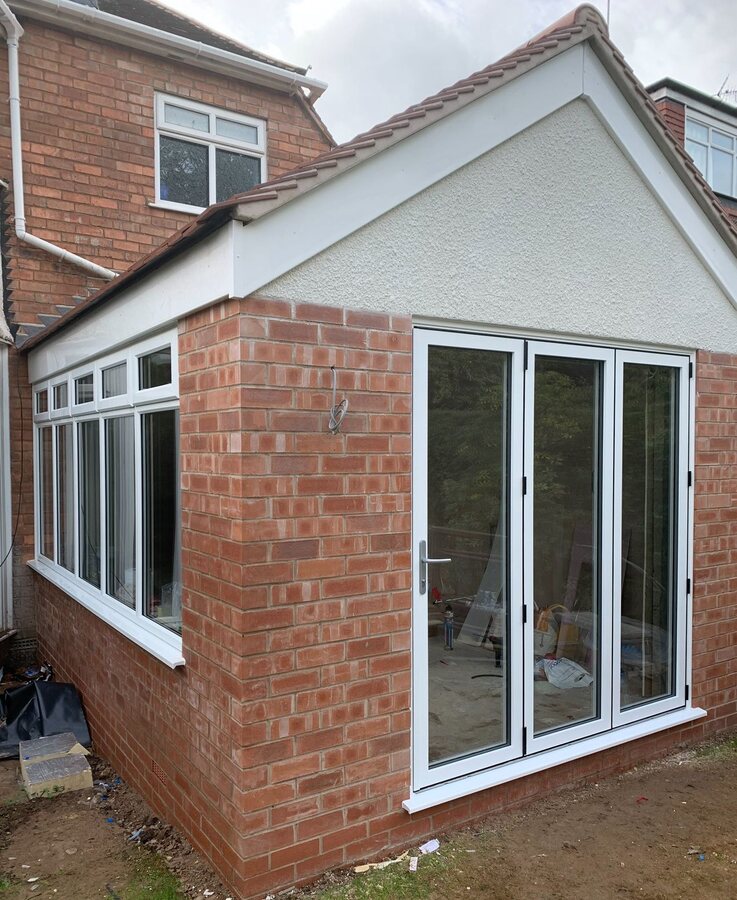 A timber-effect window installation for a Cornwall home